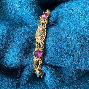 Gold Tone Bracelet with Purple Crystals